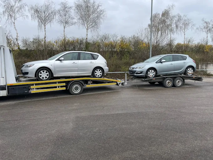 transport kilku aut osobowych laweta Świdnica